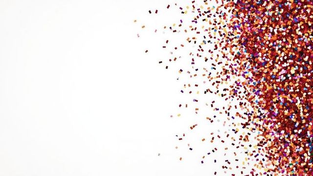 Colorful Metallic Confetti on White, Festive Celebration Background