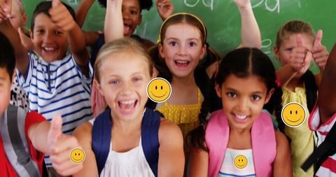 Diverse School Children Excitedly Positing Thumbs Up in Classroom - Download Free Stock Images Pikwizard.com