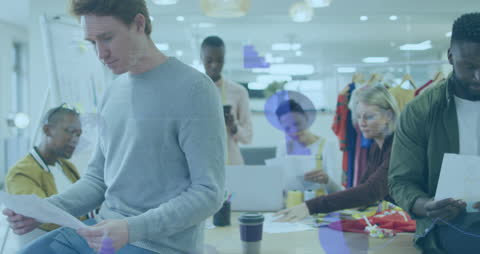 Team Focused on Data Processing in Modern Office Environment