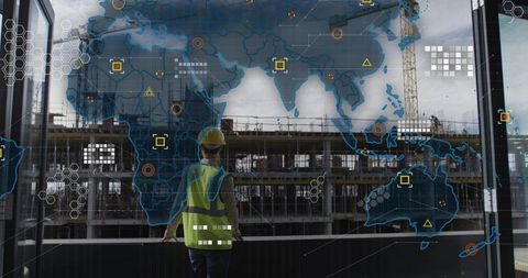 Engineer surveying global construction site with augmented reality map overlay