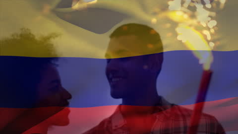 Colombian Flag Animated Over Joyful Couple at Beach