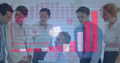 Business Team Analyzing Data with COVID-19 Graph Overlays
