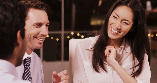 Smiling Professionals Discussing Ideas in Office Meeting - Download Free Stock Images Pikwizard.com