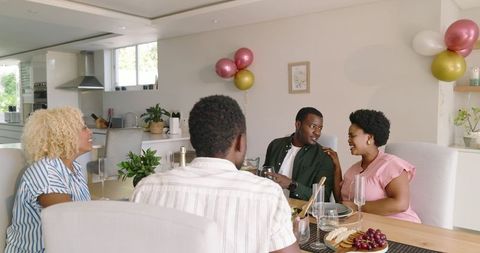 Friends Joyfully Socializing at Home