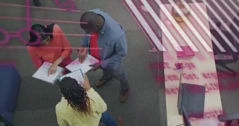 Diverse Team Engaging in Digital Collaboration and Data Analysis