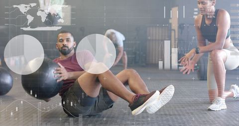 Man and Trainer Engaged in Cross Training Workout in Modern Gym