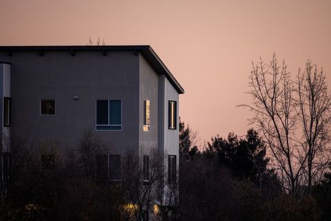 Modern Apartment Building Under Serene Evening Sky