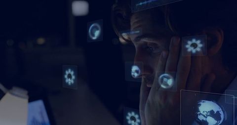 Focused Professional Analyzing Data with Abstract Technology Interface