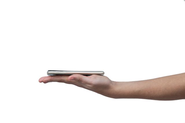 Close-up of hand holding mobile phone against white background