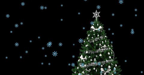 Dreamy Christmas Tree Under Falling Snow