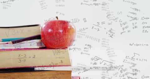Creative Display of Math Formulas with Books and Apple - Download Free Stock Images Pikwizard.com