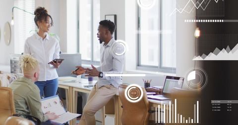 Diverse Professionals with Financial Data Holograms in Modern Office - Download Free Stock Images Pikwizard.com
