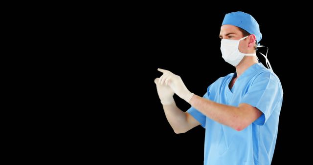 Surgeon Preparing for Operation Against Black Background - Download Free Stock Images Pikwizard.com