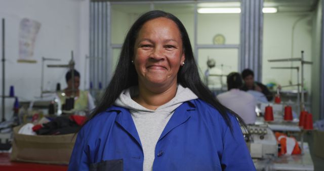 Confident Biracial Woman in Industrial Factory Environment - Download Free Stock Images Pikwizard.com