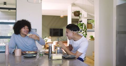 Friends Enjoying Breakfast at Modern Marble Island