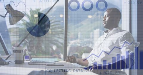 Focused Businessman Analyzing Financial Data Insights in Modern Office - Download Free Stock Images Pikwizard.com