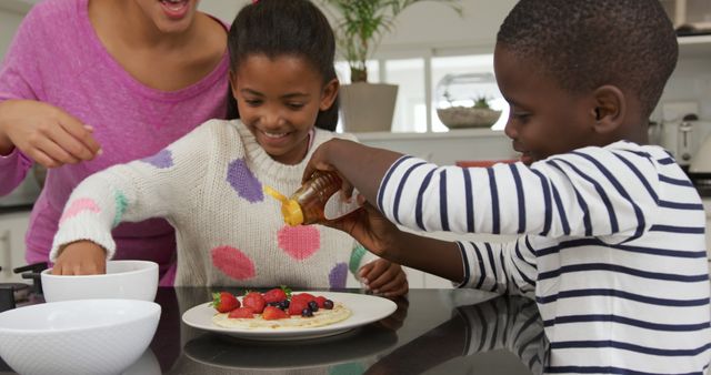 Happy Kids Making Healthy Breakfast with Mother in Bright Modern Kitchen - Download Free Stock Images Pikwizard.com