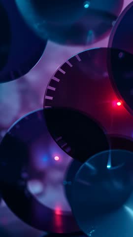 Spinning Metallic Discs Shifting with Magenta Sweeps and Bokeh Highlights Vertical Loop