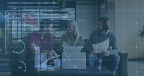 Diverse Team Collaborating on Financial Data Analysis with Technology