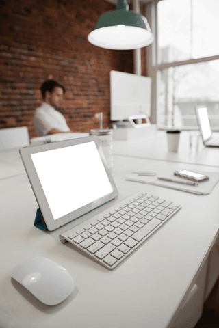 transparent tablet and keyboard on modern office desk - Download Free Stock Videos Pikwizard.com