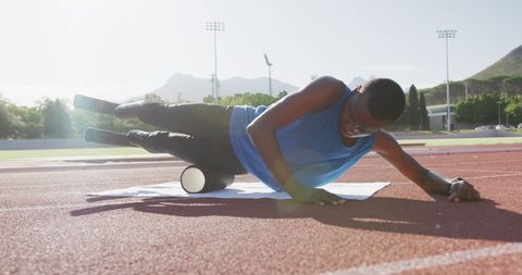 Athletic Man with Prosthetics Staying Fit at Sunlit Stadium - Download Free Stock Images Pikwizard.com