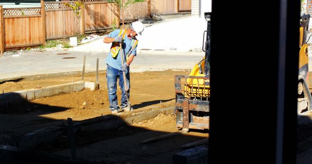 Engineer Leveling Ground at Construction Site Wearing Safety Gear - Download Free Stock Images Pikwizard.com