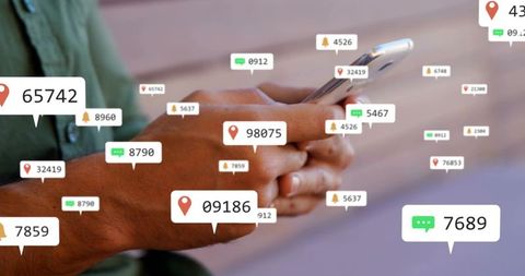 Holding Smartphone with Floating Notification Badges, Location Pins and Message Alerts