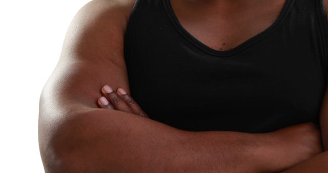 Close-Up of Man Wearing Black Tank Top and Crossing Arms - Download Free Stock Images Pikwizard.com