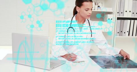 Female Doctor Analyzing X-ray with Digital Data Overlay - Download Free Stock Images Pikwizard.com
