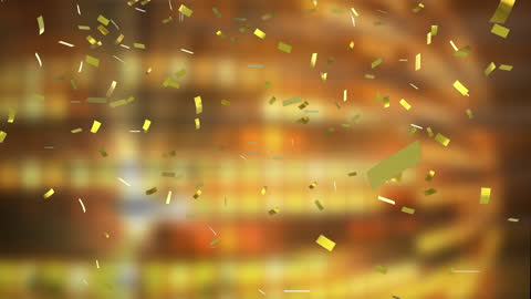 Golden Confetti Falling on Warm Gradient Background