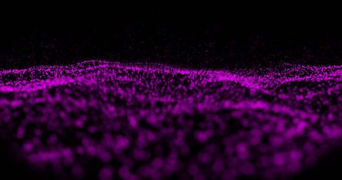 Glowing Purple Particles Creating Futuristic Wave Form