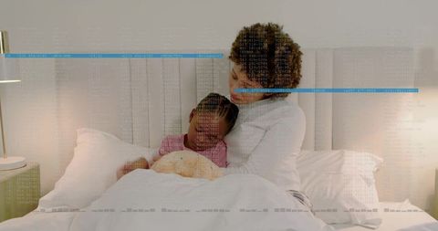 Mother cradling sleeping child on bed with teddy bear cozy nighttime family bonding