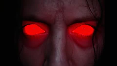 Illuminating Red Eyes in Black Void