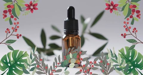 Natural Herbal Oil Bottle in Floral Frame for Aromatherapy - Download Free Stock Images Pikwizard.com