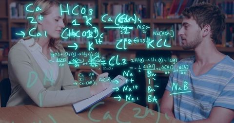 Students Engaging in Scientific Discussion with Digital Equations - Download Free Stock Images Pikwizard.com