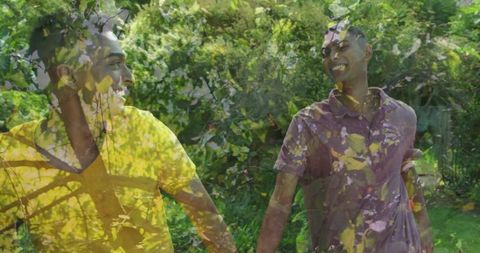 Joyful Biracial Male Couple Enjoying Nature Double Exposure