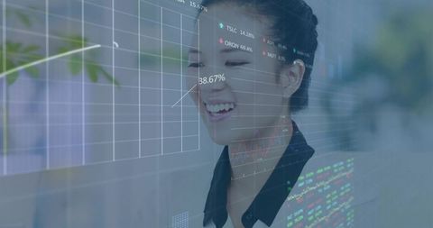 Businesswoman Analyzing Interactive Financial Data in Modern Office