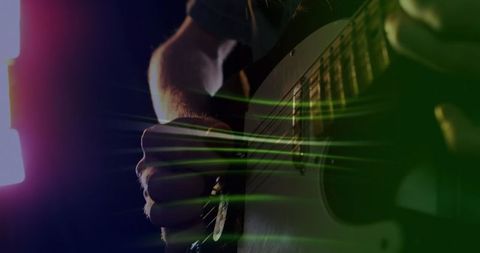 Electric Guitarist Creating Colorful Streaks in Concert Atmosphere - Download Free Stock Images Pikwizard.com