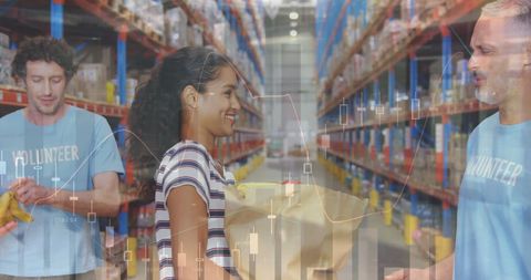 Smiling Volunteer Donating Goods at Warehouse Facility - Download Free Stock Images Pikwizard.com
