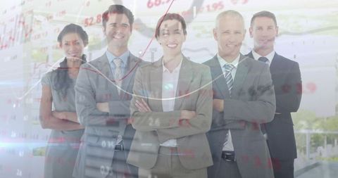 Confident executive team standing with arms crossed over transparent financial charts