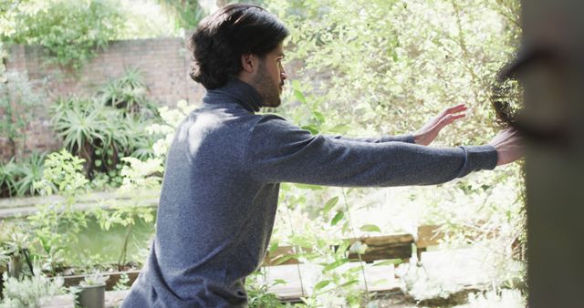 Man Practicing Tai Chi in Serene Garden Setting - Download Free Stock Images Pikwizard.com