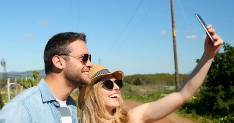 Couple Taking a Selfie on a Scenic Country Road - Download Free Stock Images Pikwizard.com