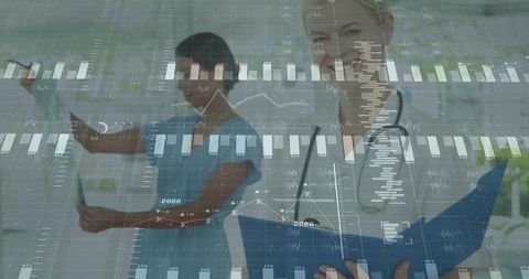 Healthcare professionals analyzing data at medical office