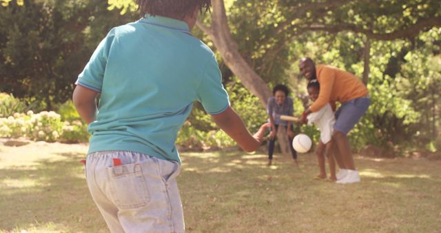 Family Enjoying Outdoor Game of Cricket in Park - Download Free Stock Images Pikwizard.com