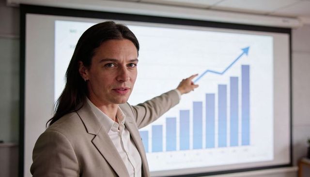 Female Presenter Pointing to Rising Bar Chart Showing Business Growth and Data Analytics