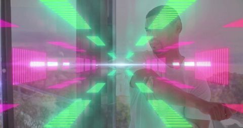 Man stretching by glass wall with neon holographic chevron tunnel, futuristic fitness