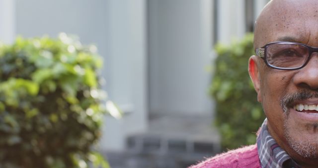 Smiling Elderly Man Wearing Glasses on a Sunny Day - Download Free Stock Images Pikwizard.com