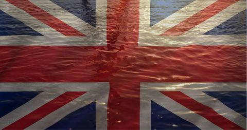 Gentle flow of water reflecting british flag colors