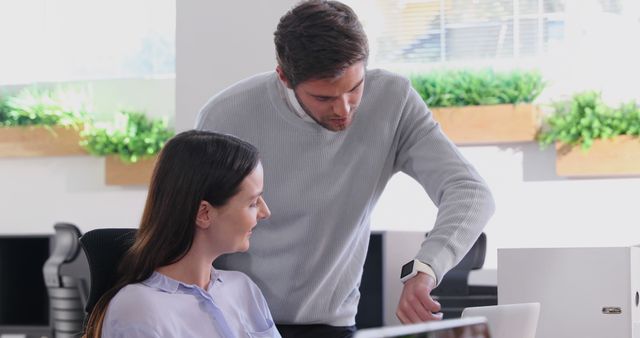 Coworkers Collaborating at Modern Office Desk - Download Free Stock Images Pikwizard.com