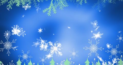 Snowflakes falling on abstract blue winter background